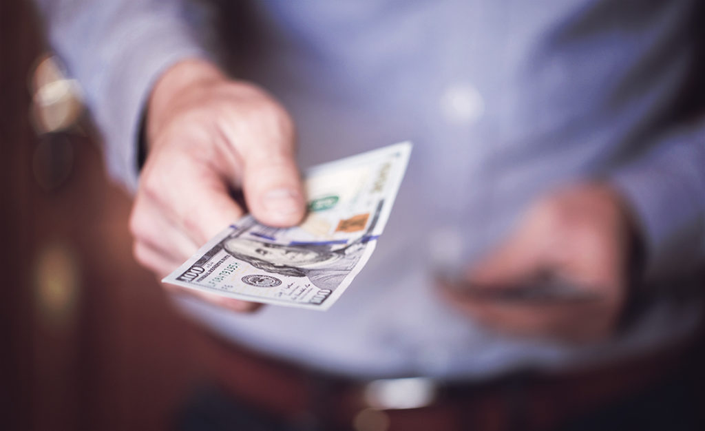 Businessman Holding Money In His Hands